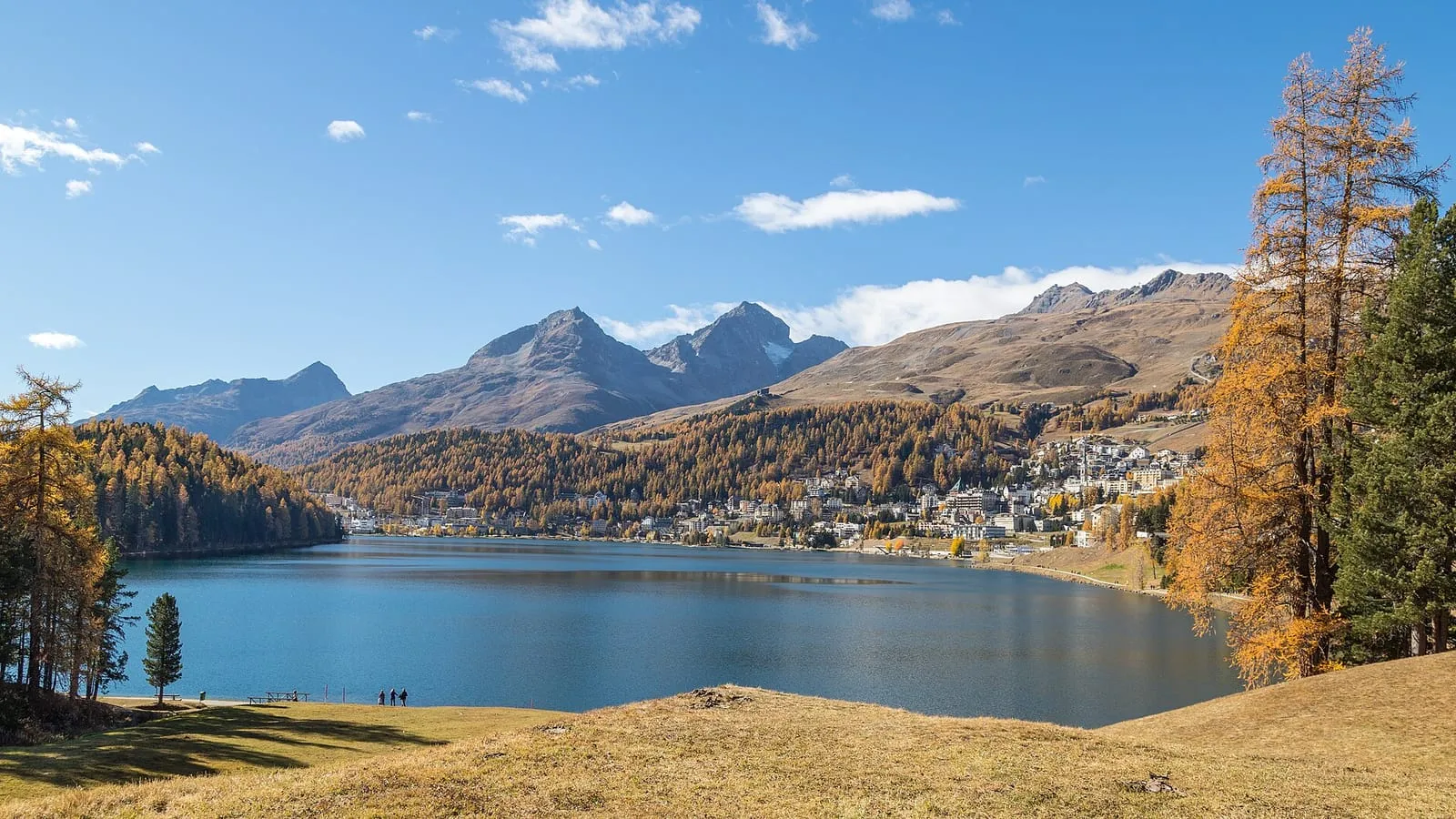 St. Moritz and its lake in the Engadin valley, ringed by the Swiss Alps, the destination of this private transfer from Milan